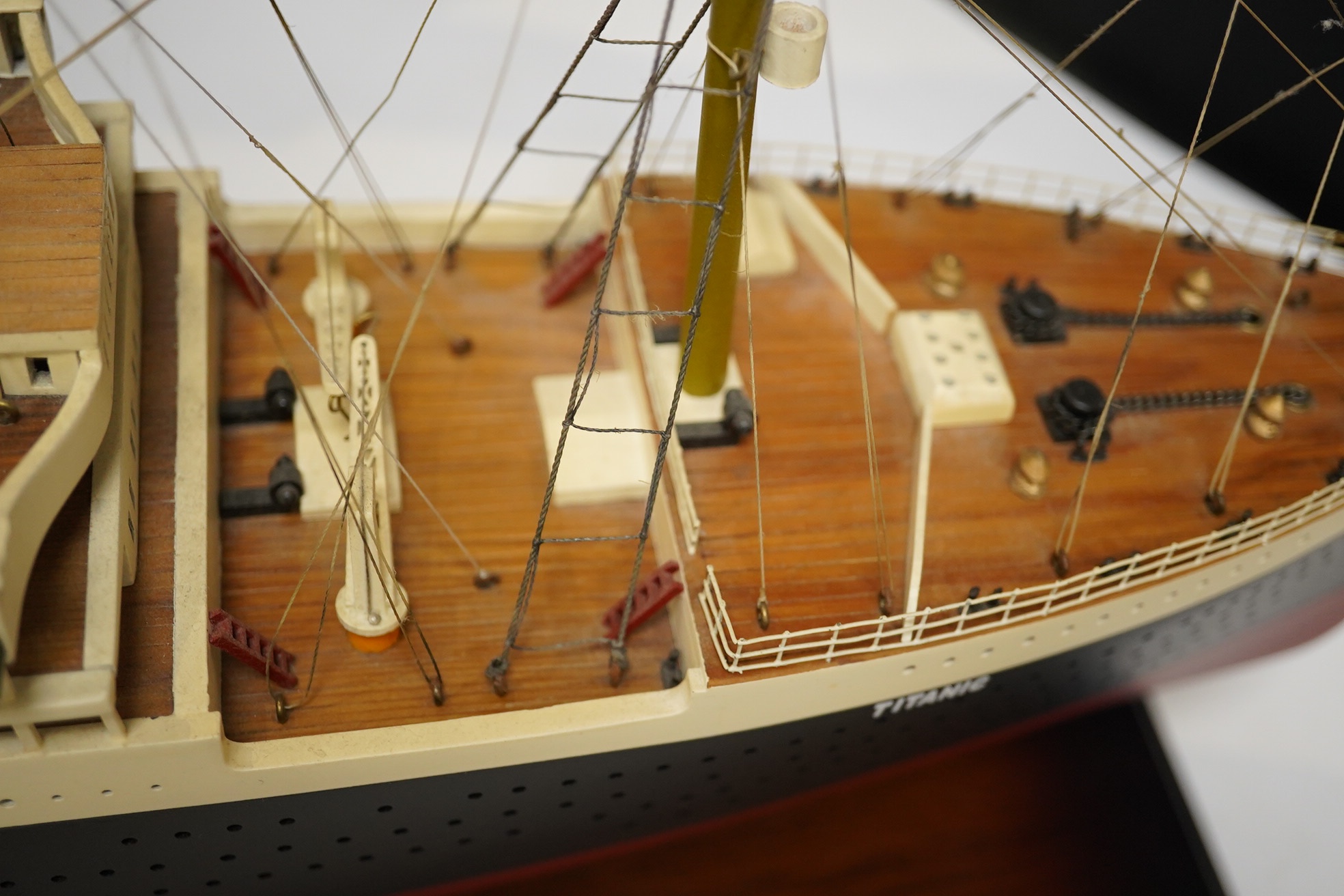 An 'Authentic Models' model of the ocean liner RMS Titanic, on stand, 100cm long. Condition - good.